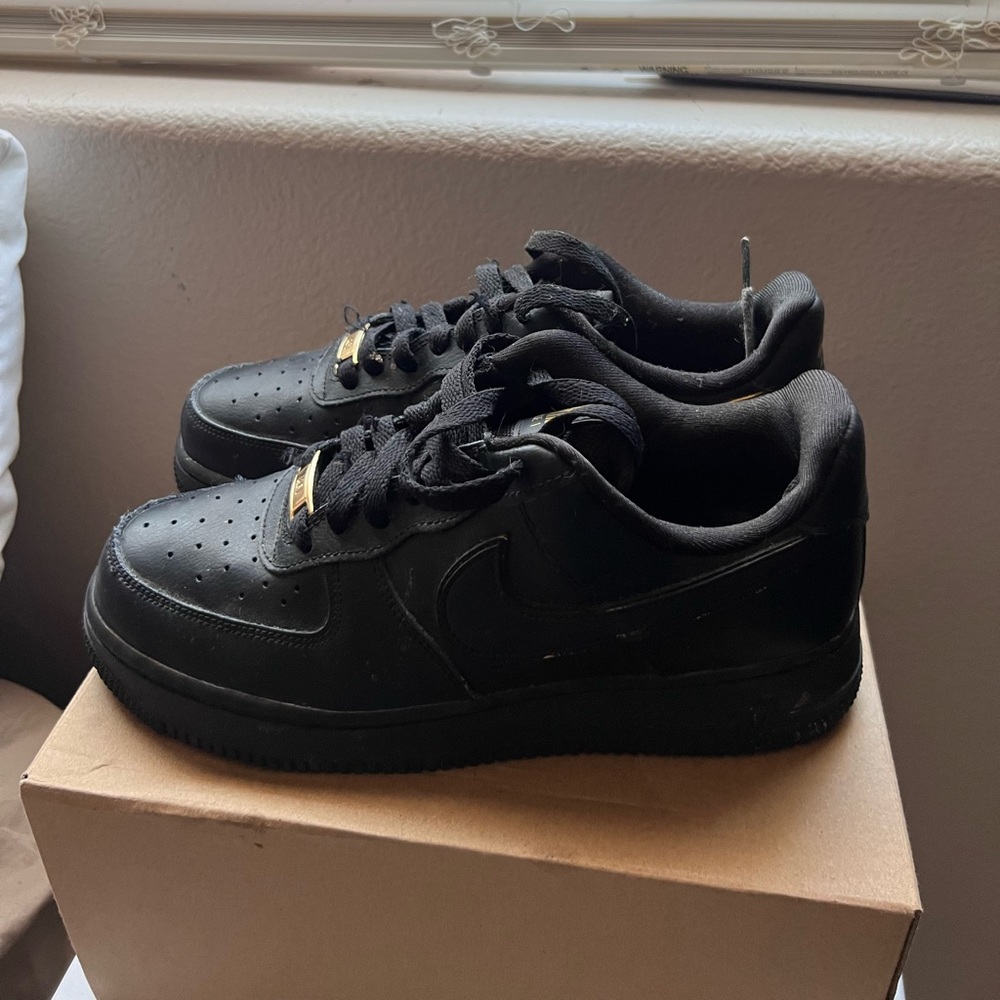Nike Air Force 1s black and gold women’s size 8